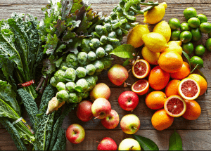 a group of fruits and vegetables on a wood surface Healthy Weight Loss Diets Small Heath